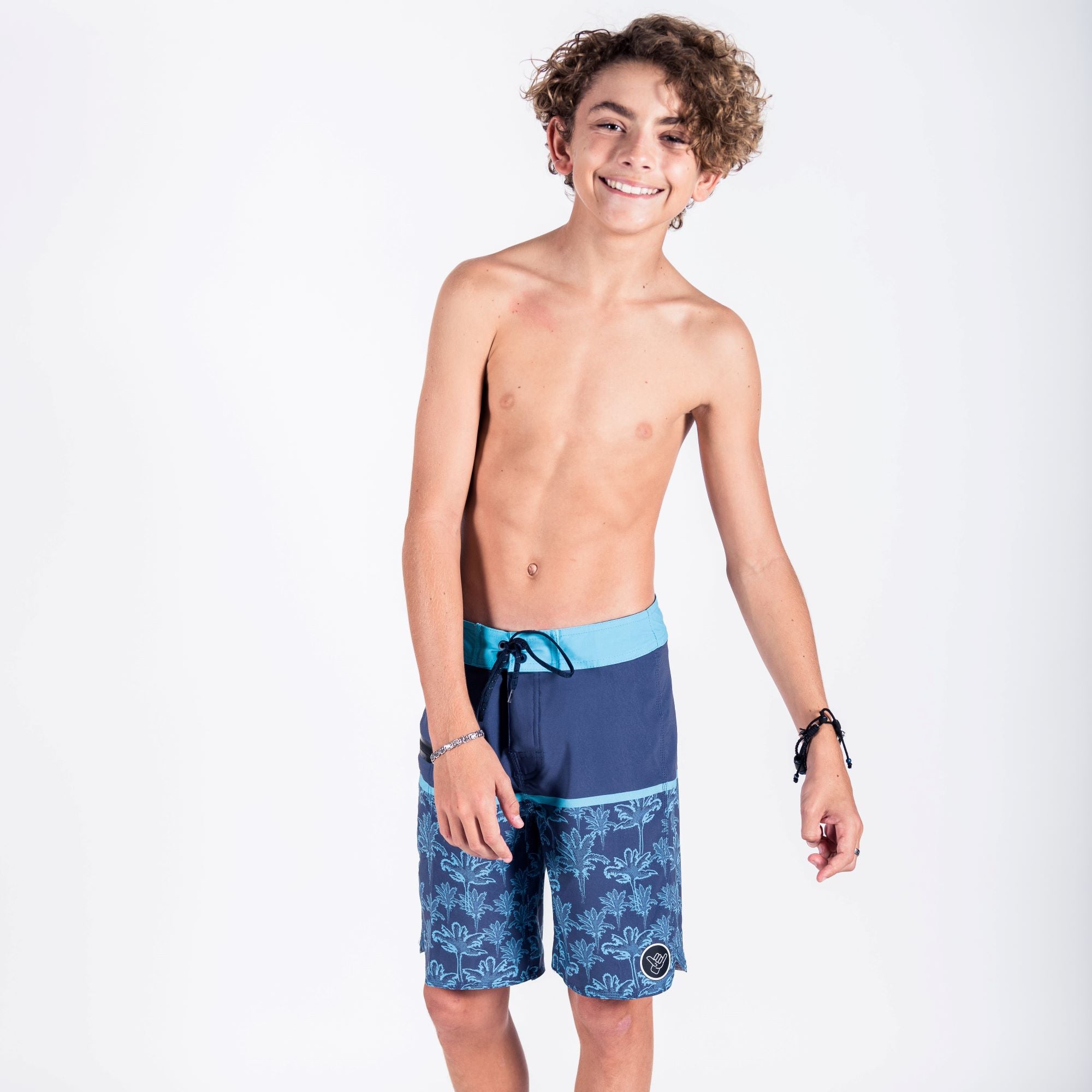 Boys store in boardshorts